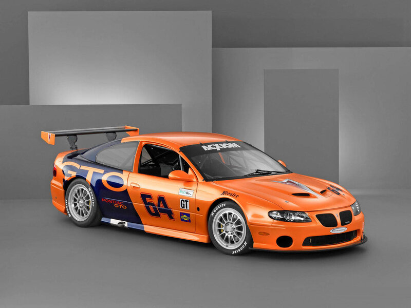 Orange race car with number 64