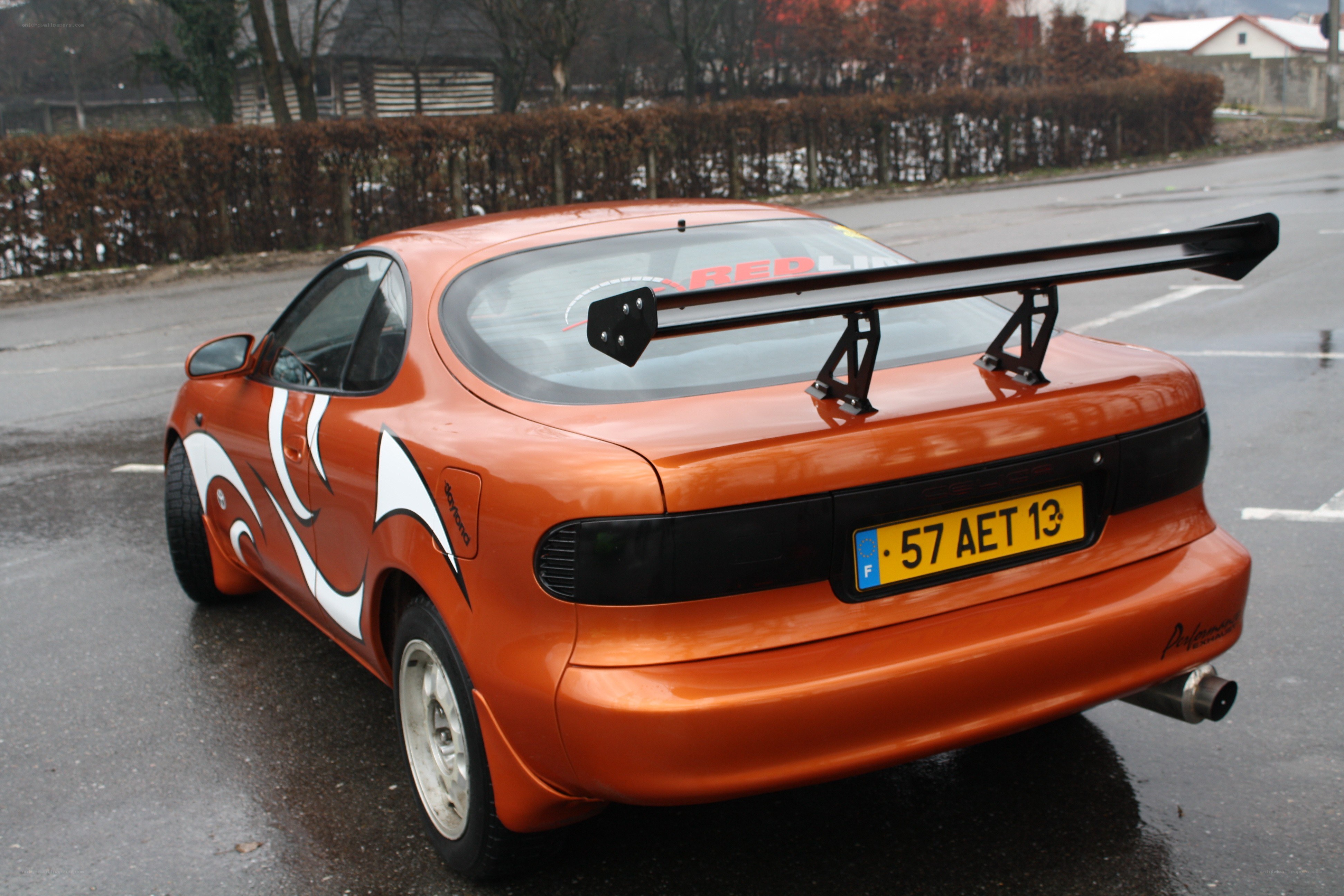 orange race car with spoiler