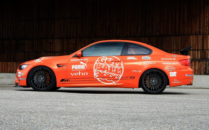 orange race car with sponsor decals