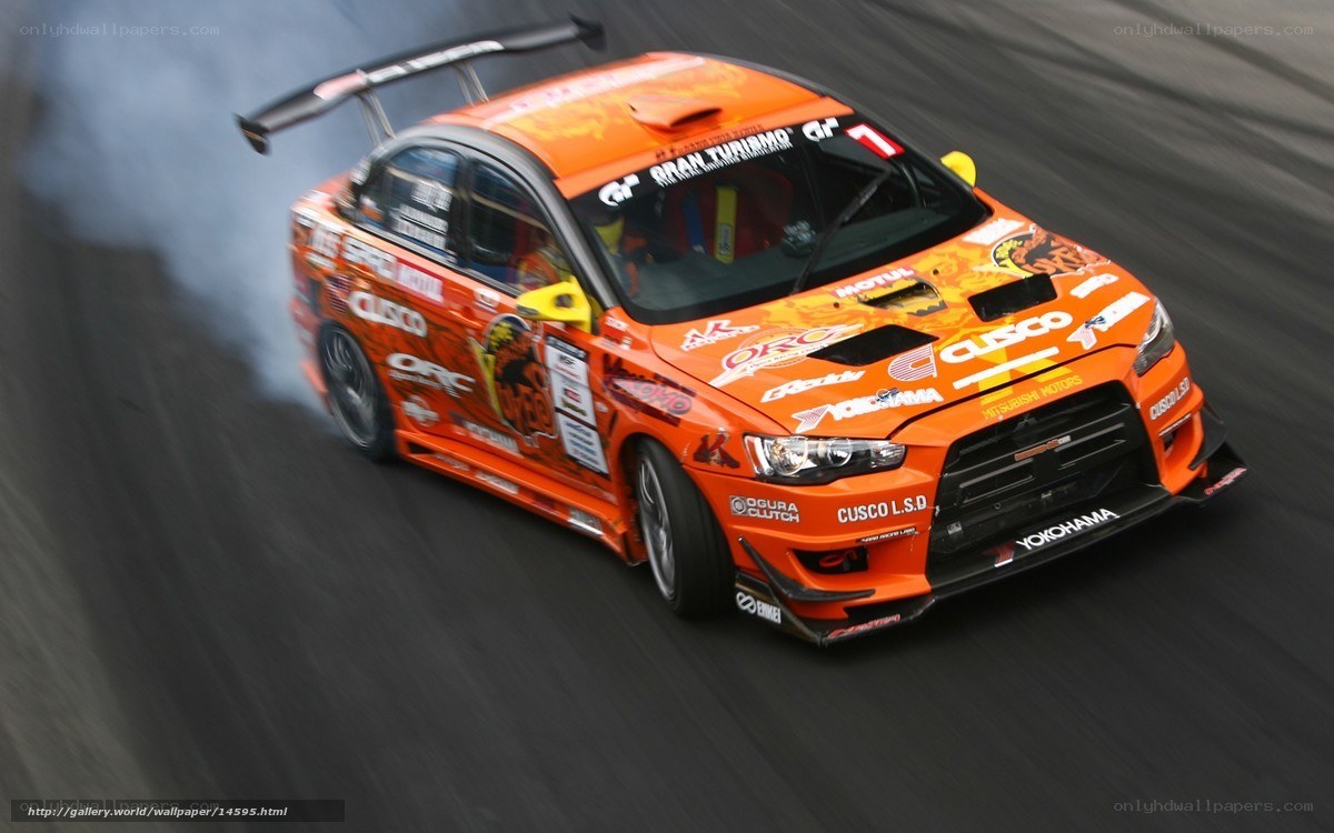 orange racing car drifting
