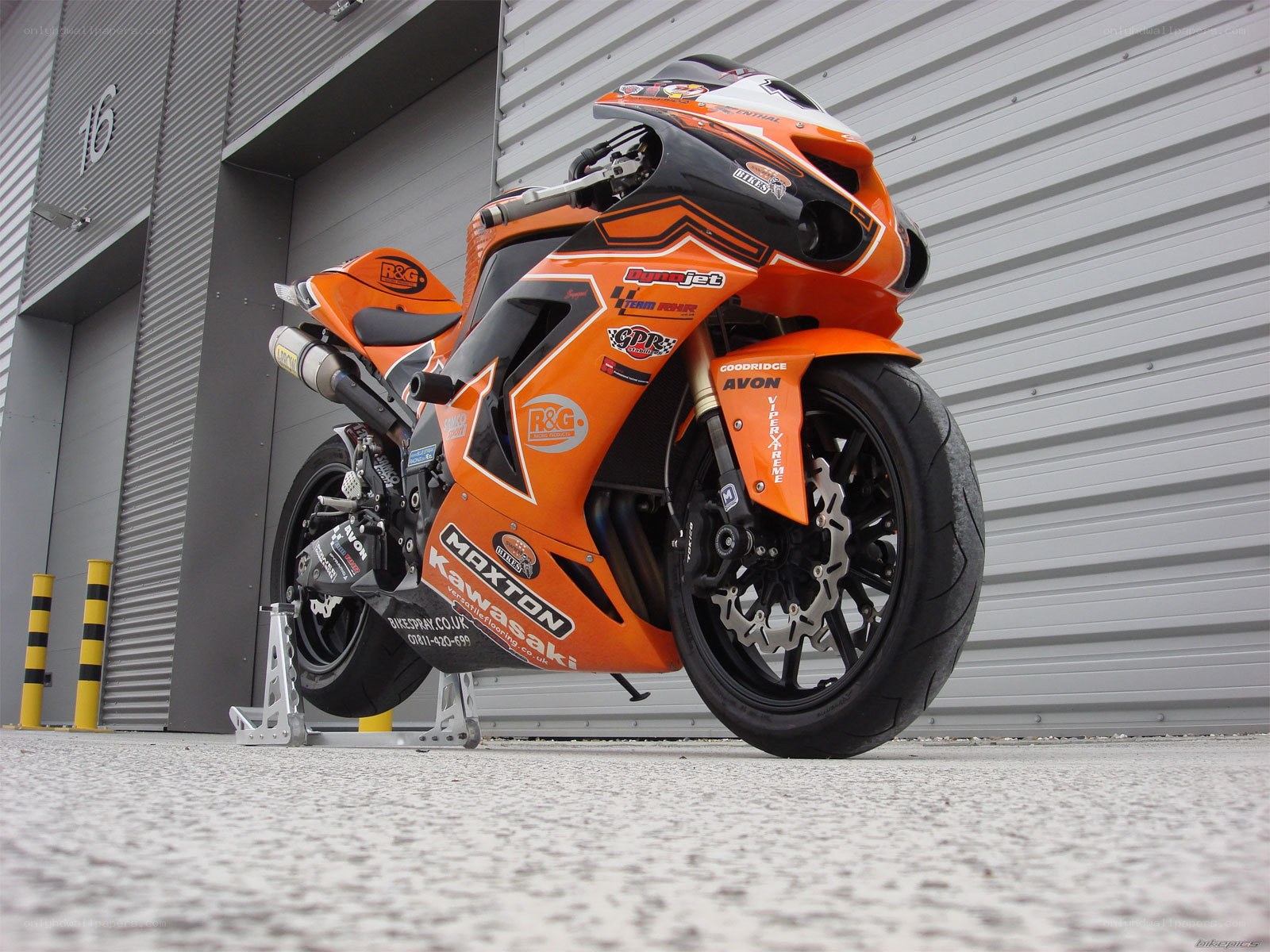 orange racing motorcycle
