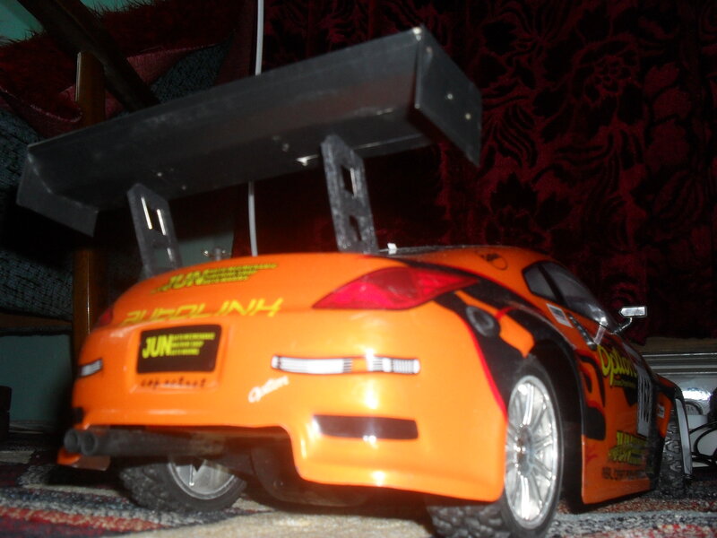 Orange Remote Control Car — Dramatic
