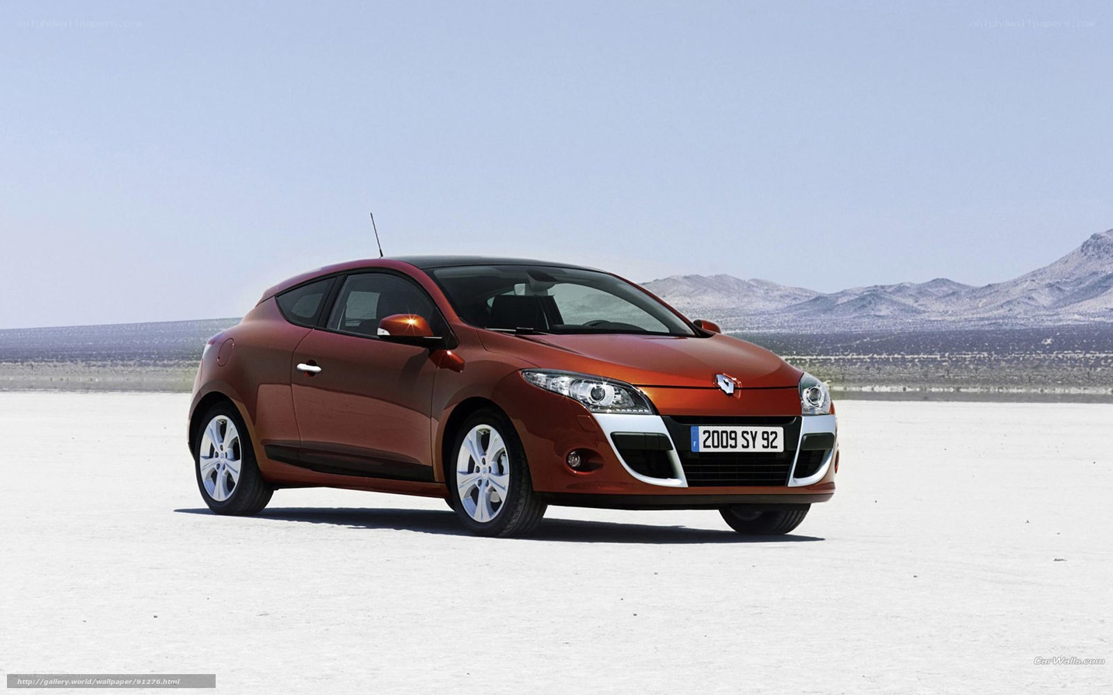 Orange Renault Megane in desert