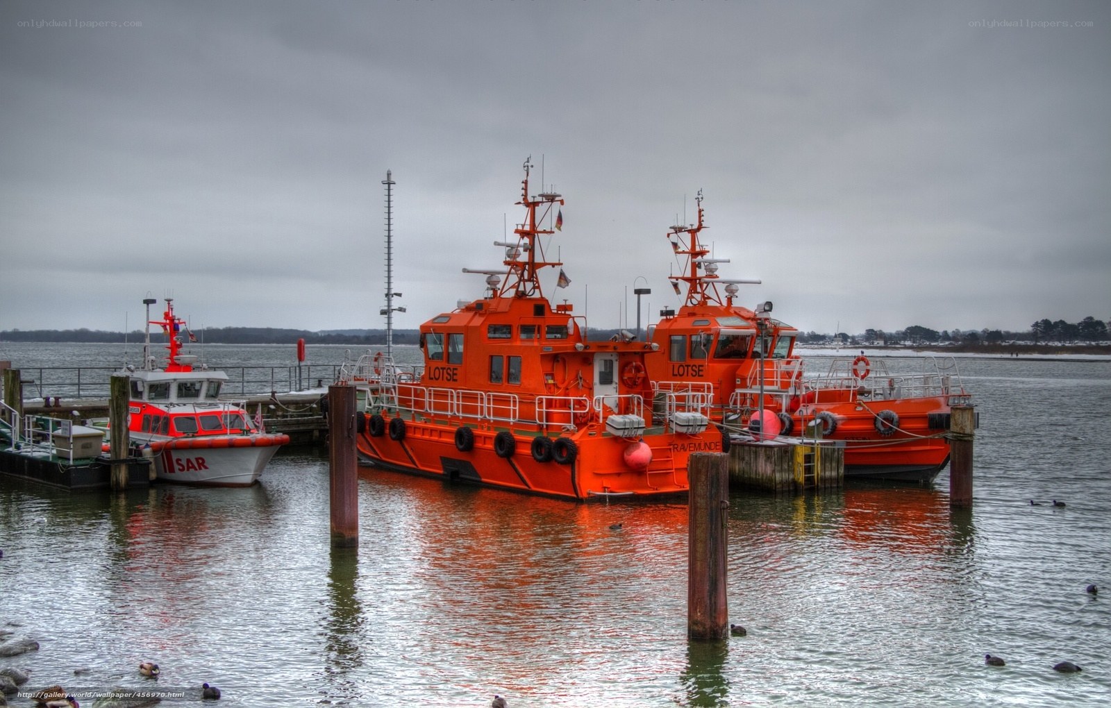 Orange rescue boats at dock