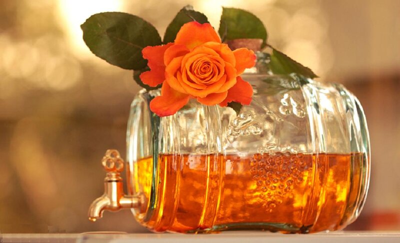Orange Rose in Glass Container