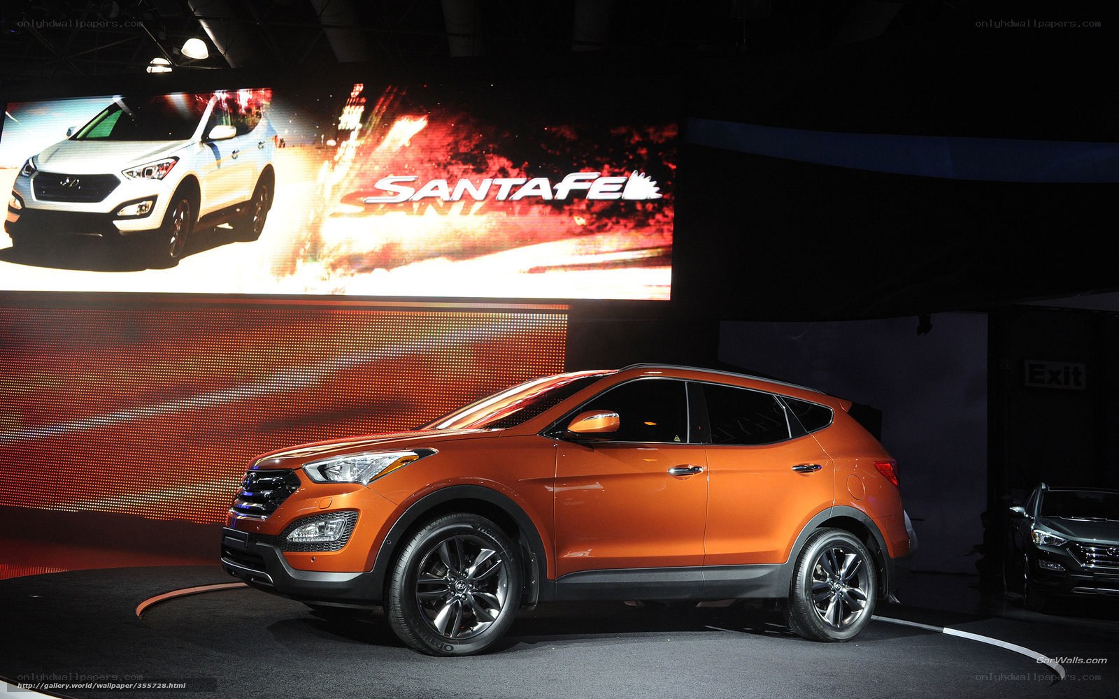 Orange Santa Fe SUV on display