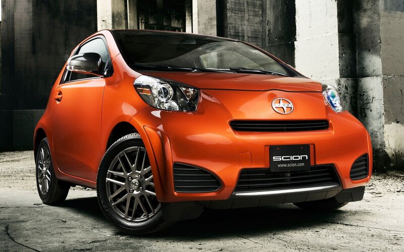 Orange Scion iQ compact car