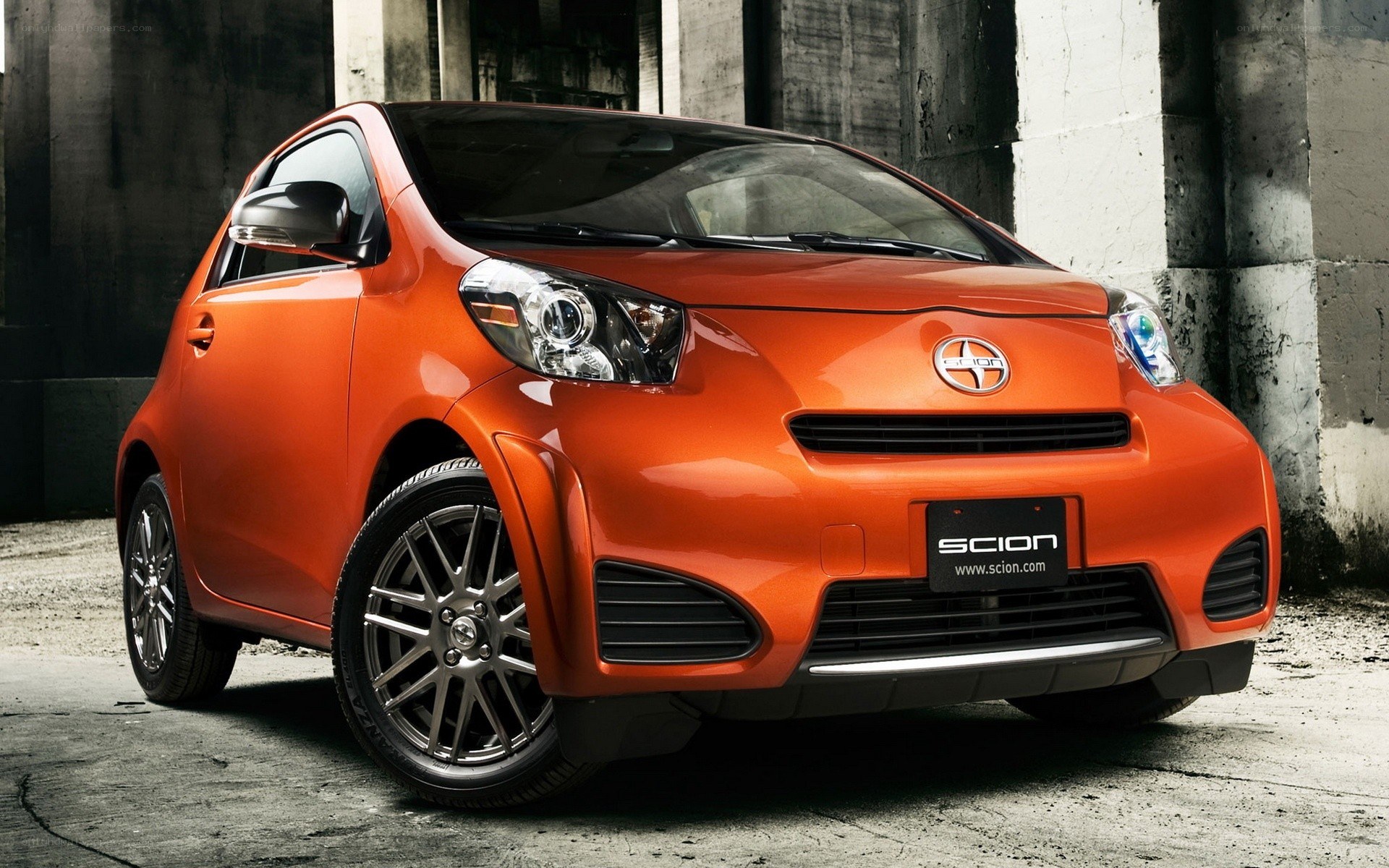 Orange Scion iQ compact car