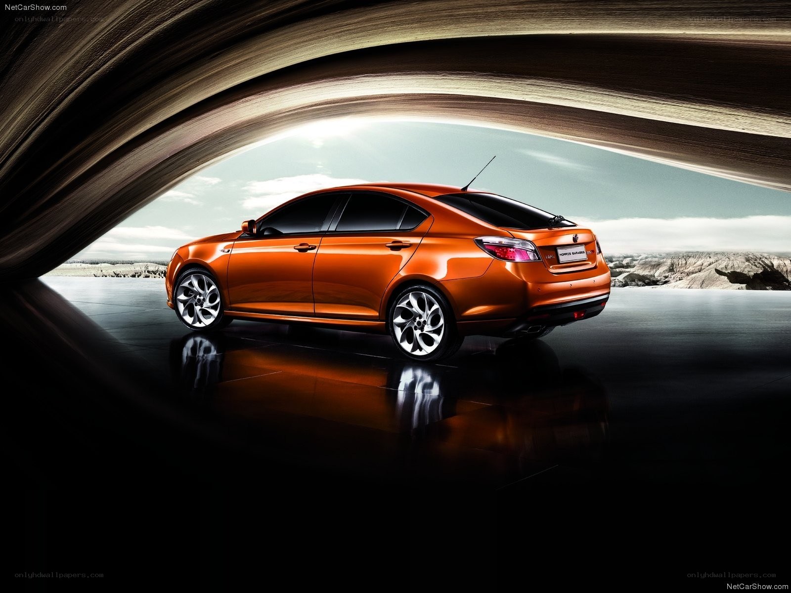 Orange sedan in tunnel