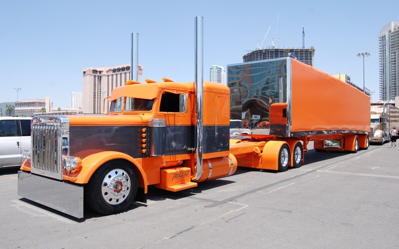 Orange semi-truck on display