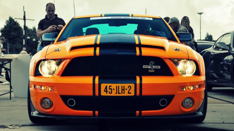 orange Shelby Mustang at car show