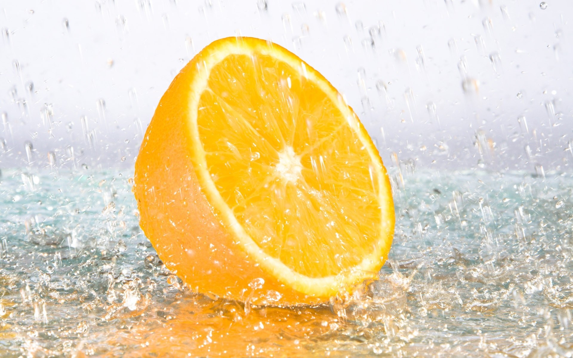 orange slice in water splash