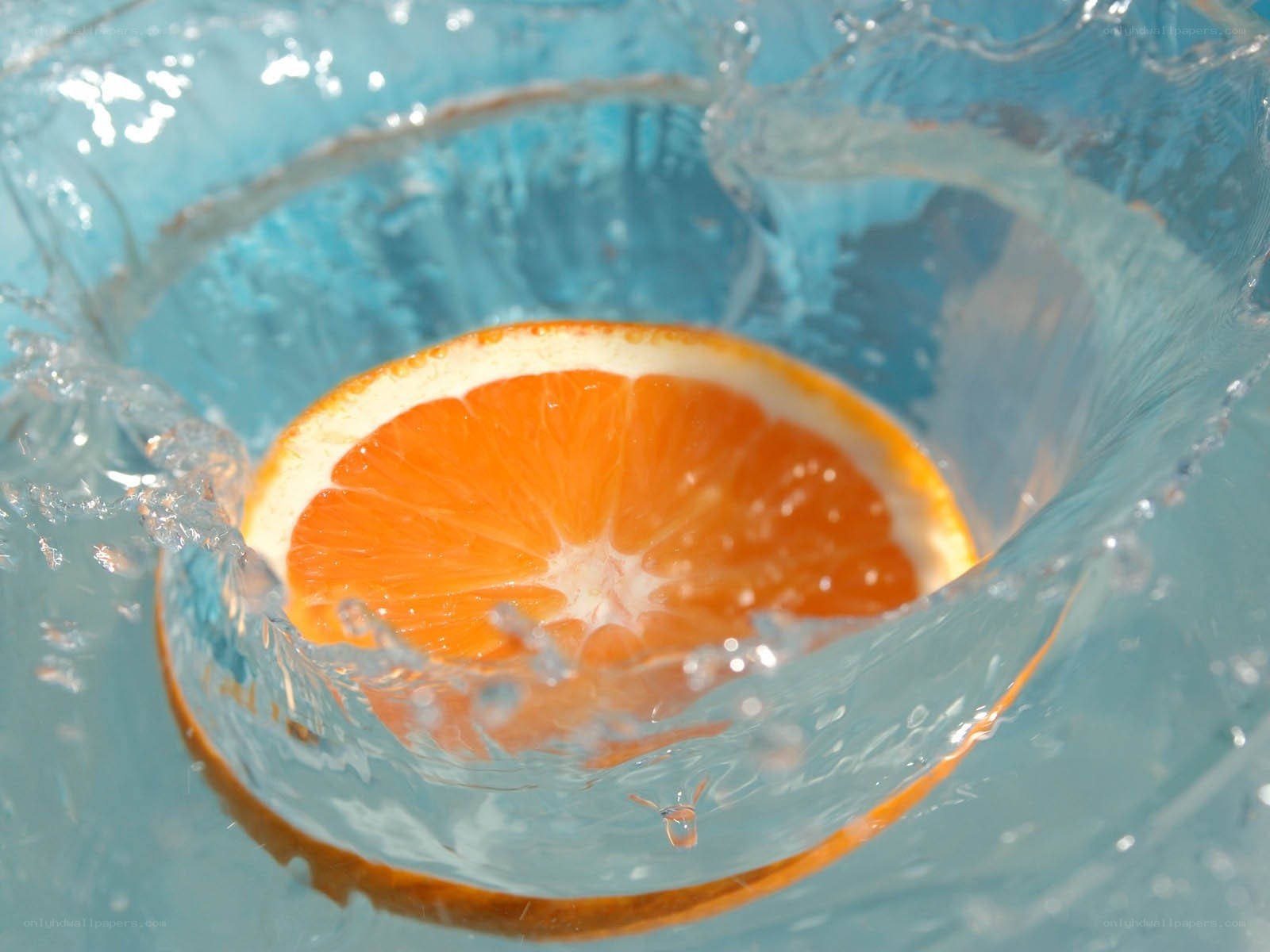 Orange slice in water splash