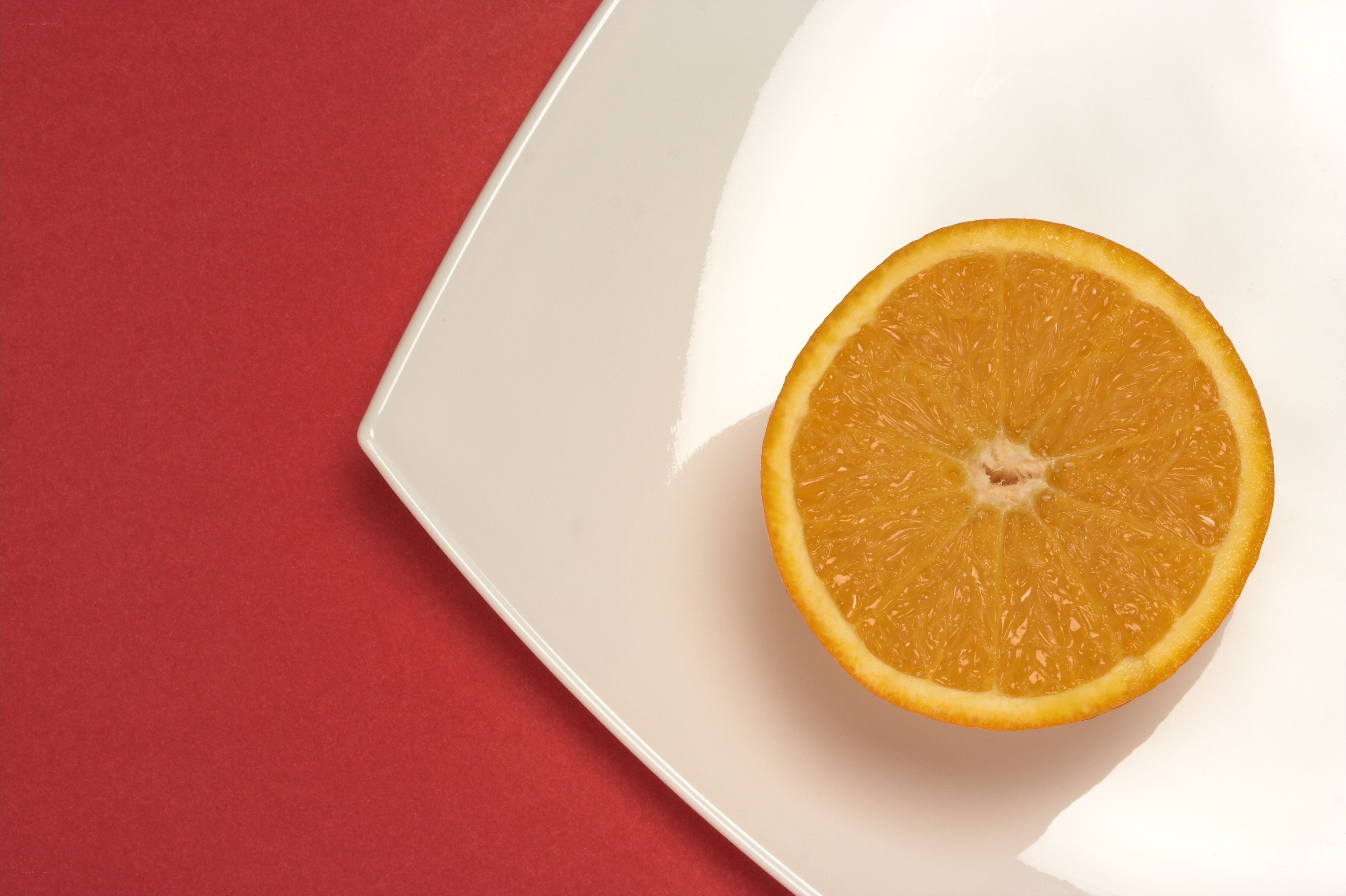 orange slice on white plate