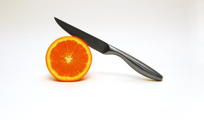 orange slice with knife