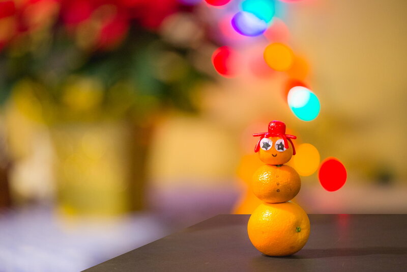 Orange Snowman Figure
