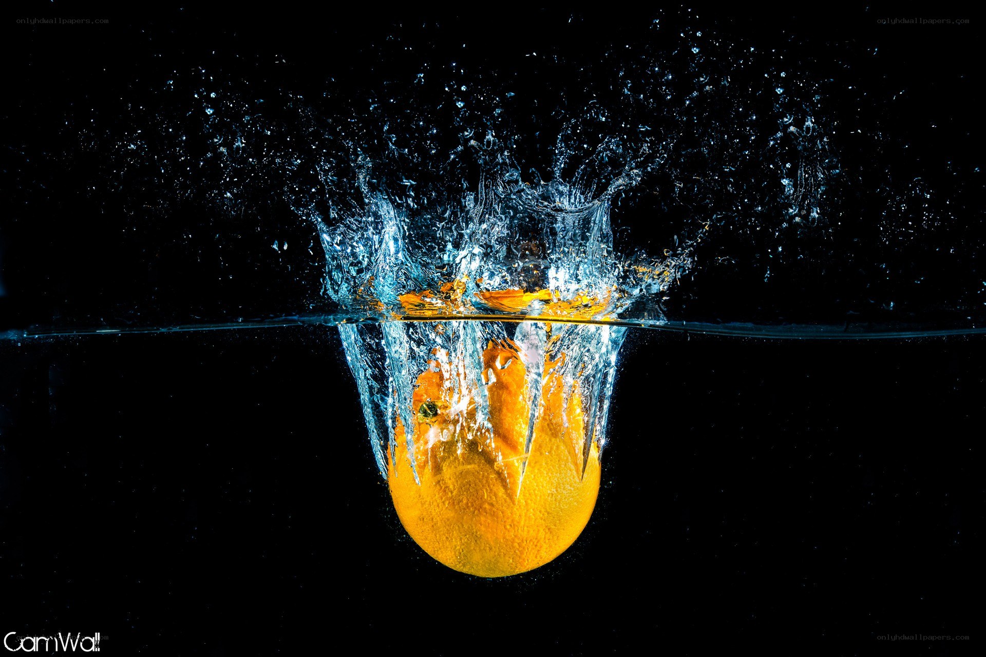 orange splashing in water