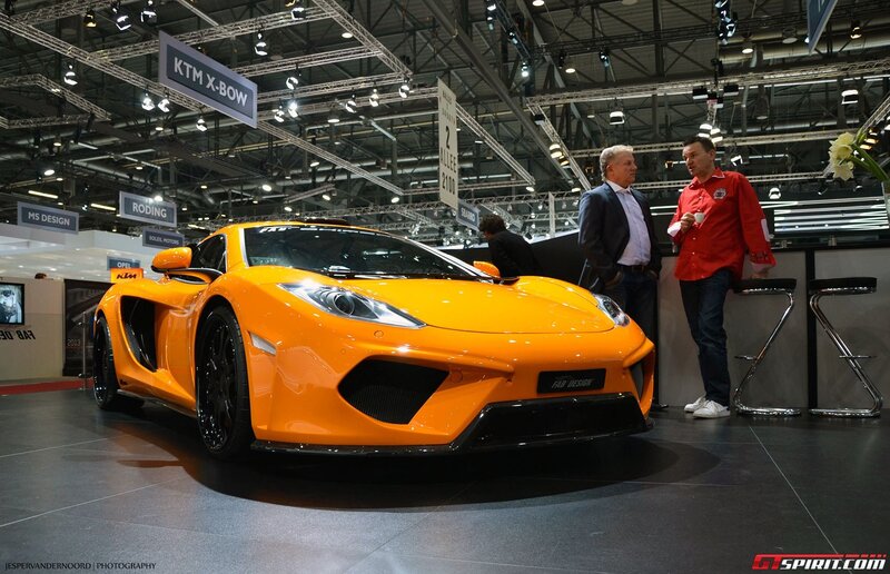 Orange sports car at auto show