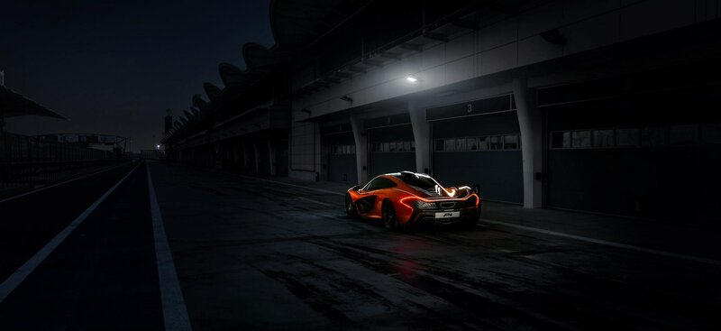 Orange Sports Car — Black, Dramatic, Night, Photograph, Race Track