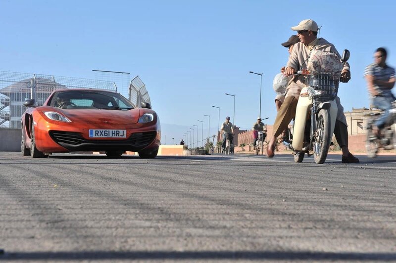 Orange Sports Car — Bright, Afternoon, Photograph, Motorcycle
