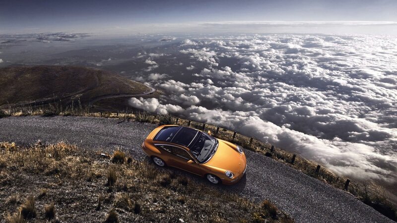 Orange Sports Car — Dramatic, Afternoon, Photograph, Clouds