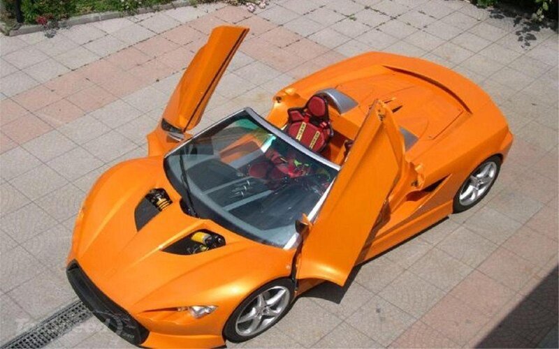 Orange Sports Car — Dramatic, Afternoon, Photograph, Red Seats