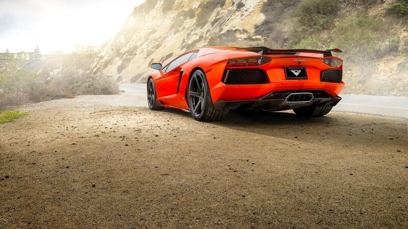 Orange Sports Car — Dramatic, Afternoon, Photograph, Road, Cliff