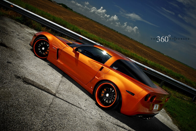Orange Sports Car — Dramatic, Afternoon, Photograph, Road, Guardrail