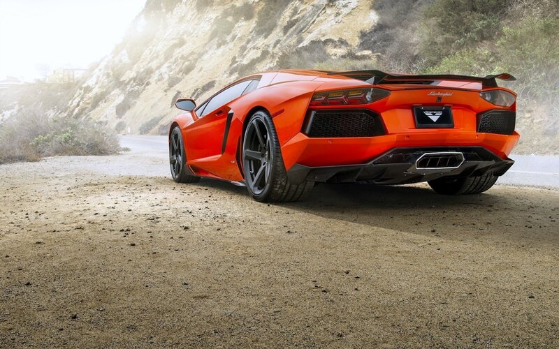 Orange Sports Car — Dramatic, Afternoon, Photograph, Road, Hillside