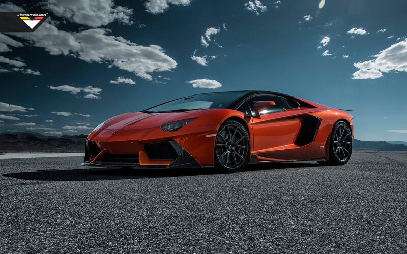 Orange Sports Car — Dramatic, Afternoon, Photograph, Road, Mountains
