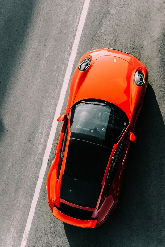 Orange Sports Car — Dramatic, Afternoon, Photograph, Road, White Line