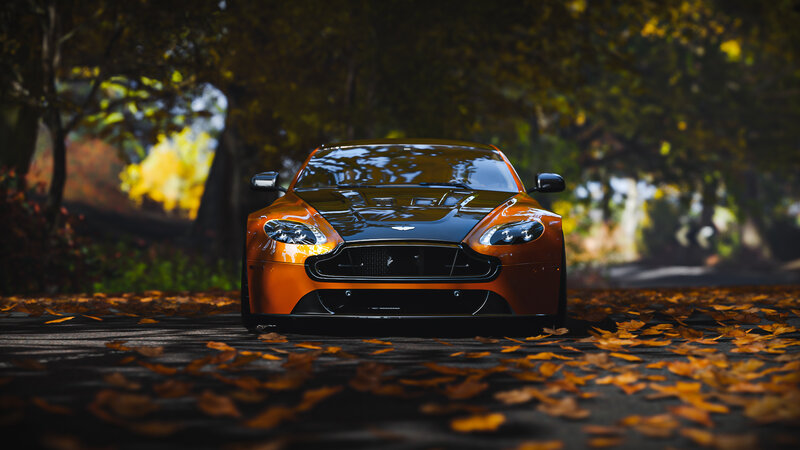 Orange Sports Car — Dramatic, Autumn, Photograph, Leaves