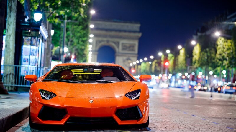 Orange Sports Car — Dramatic, Night, Photograph, Arc De Triomphe