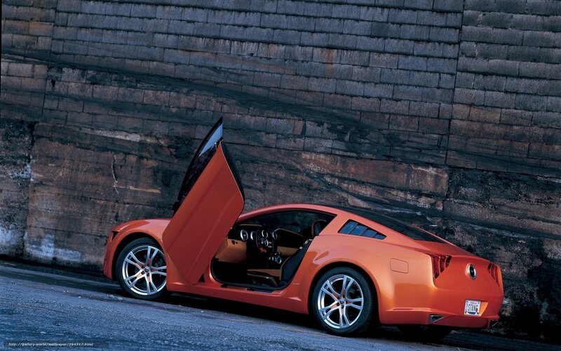 Orange Sports Car — Dramatic, Night, Photograph, Brick Wall, Open Door