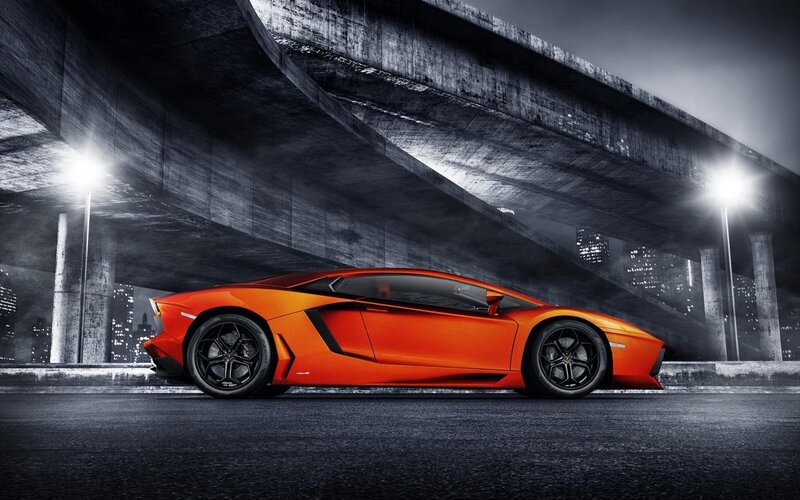 Orange Sports Car — Dramatic, Night, Photograph, Bridge