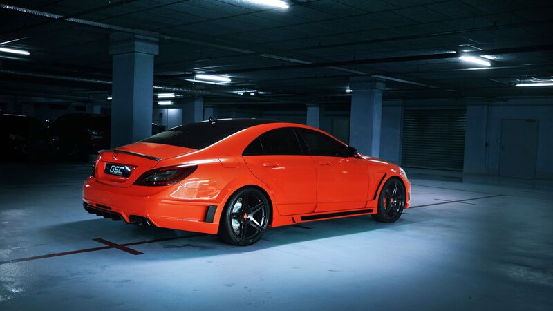 Orange Sports Car — Dramatic, Night, Photograph, Parking Garage