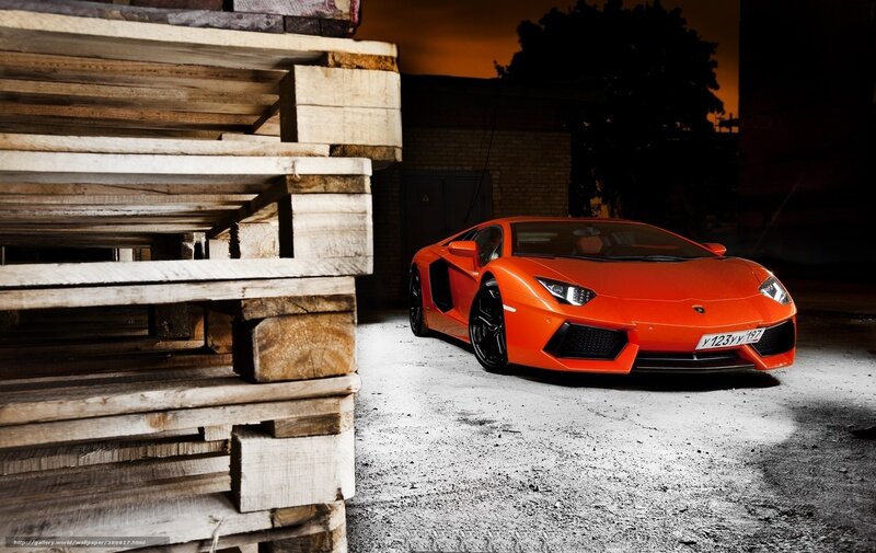 Orange Sports Car — Dramatic, Night, Photograph, Wooden Pallets