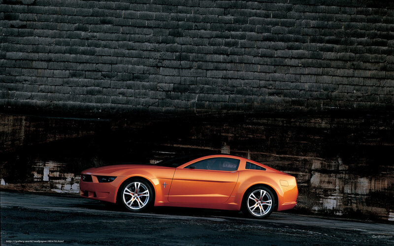 Orange Sports Car — Dramatic, Photograph, Brick Wall