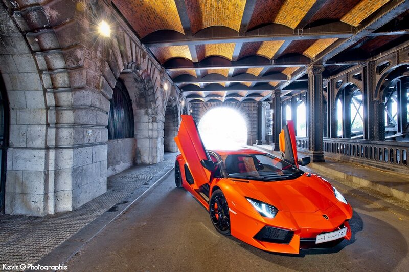 Orange Sports Car — Dramatic, Photograph, Bridge, Arches