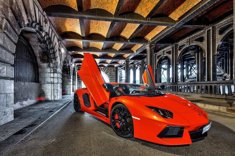 Orange Sports Car — Dramatic, Photograph, Bridge, Open Doors