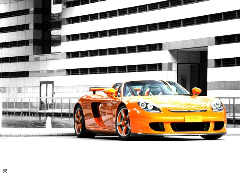 Orange Sports Car — Dramatic, Photograph, Building, Fountain