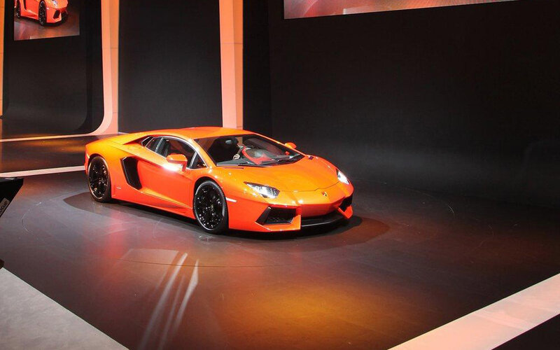 Orange Sports Car — Dramatic, Photograph, Display Stand