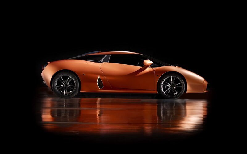 Orange Sports Car — Dramatic, Photograph, Floor