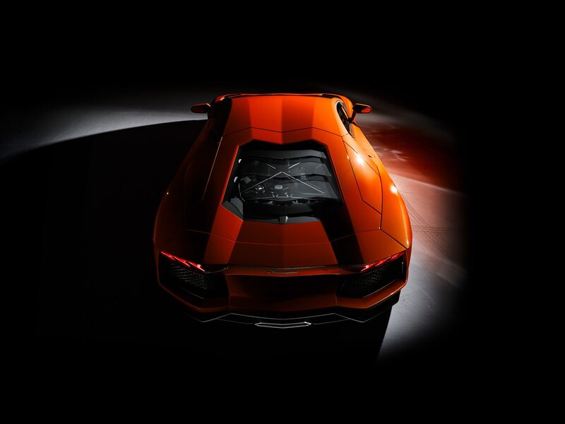 Orange Sports Car — Dramatic, Photograph, Headlights, Dark Background