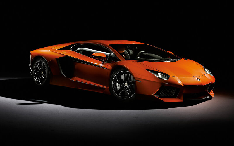 Orange Sports Car — Dramatic, Photograph, Headlights, Wheels