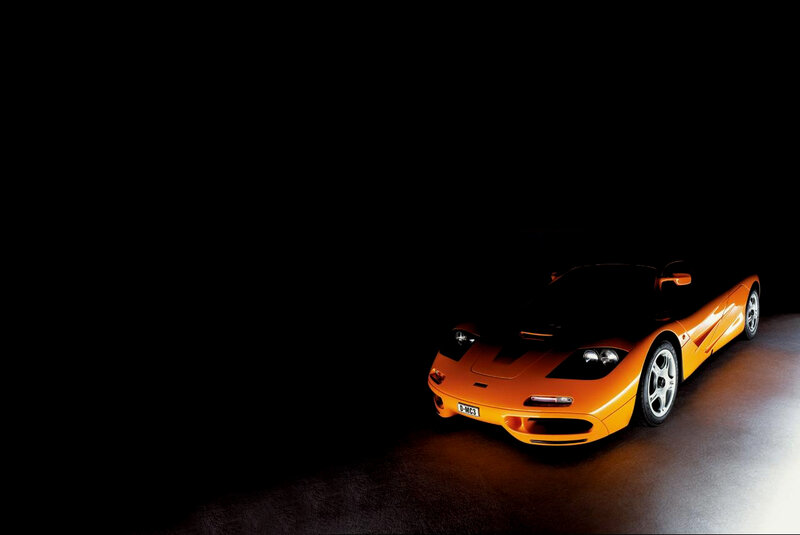 Orange Sports Car — Dramatic, Photograph, License Plate, Dark Background