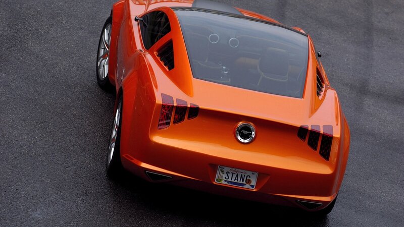 Orange Sports Car — Dramatic, Photograph, License Plate, Rear Window