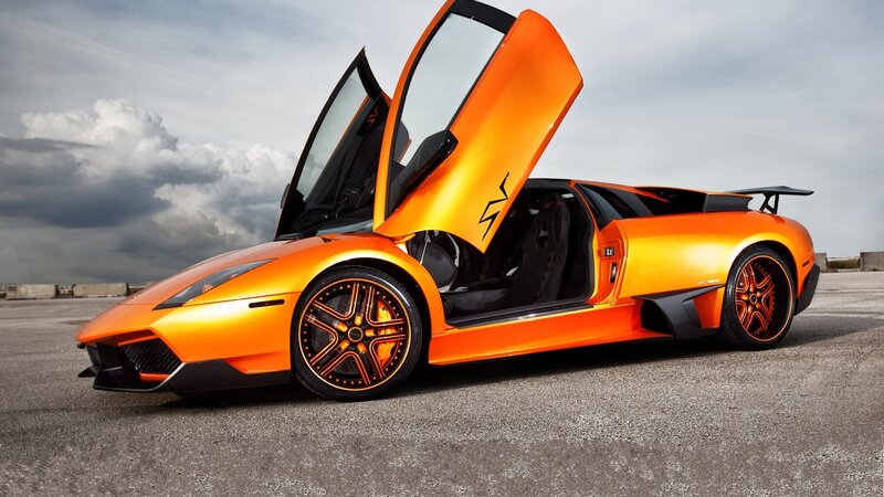 Orange Sports Car — Dramatic, Photograph, Open Doors