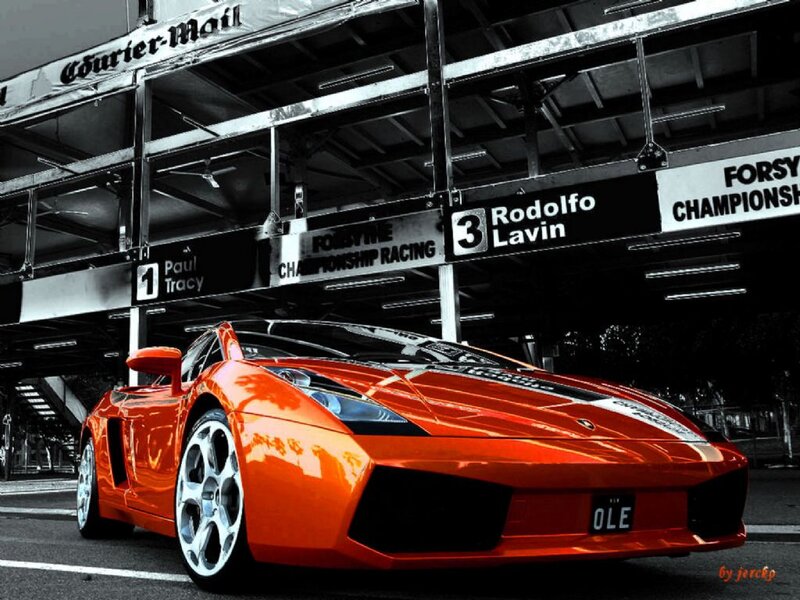 Orange Sports Car — Dramatic, Photograph, Race Track, Signs