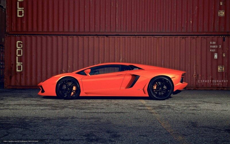 Orange Sports Car — Dramatic, Photograph, Shipping Container